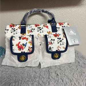Disney White Satchel with Navy Trim featuring Mickey Through The Years Print